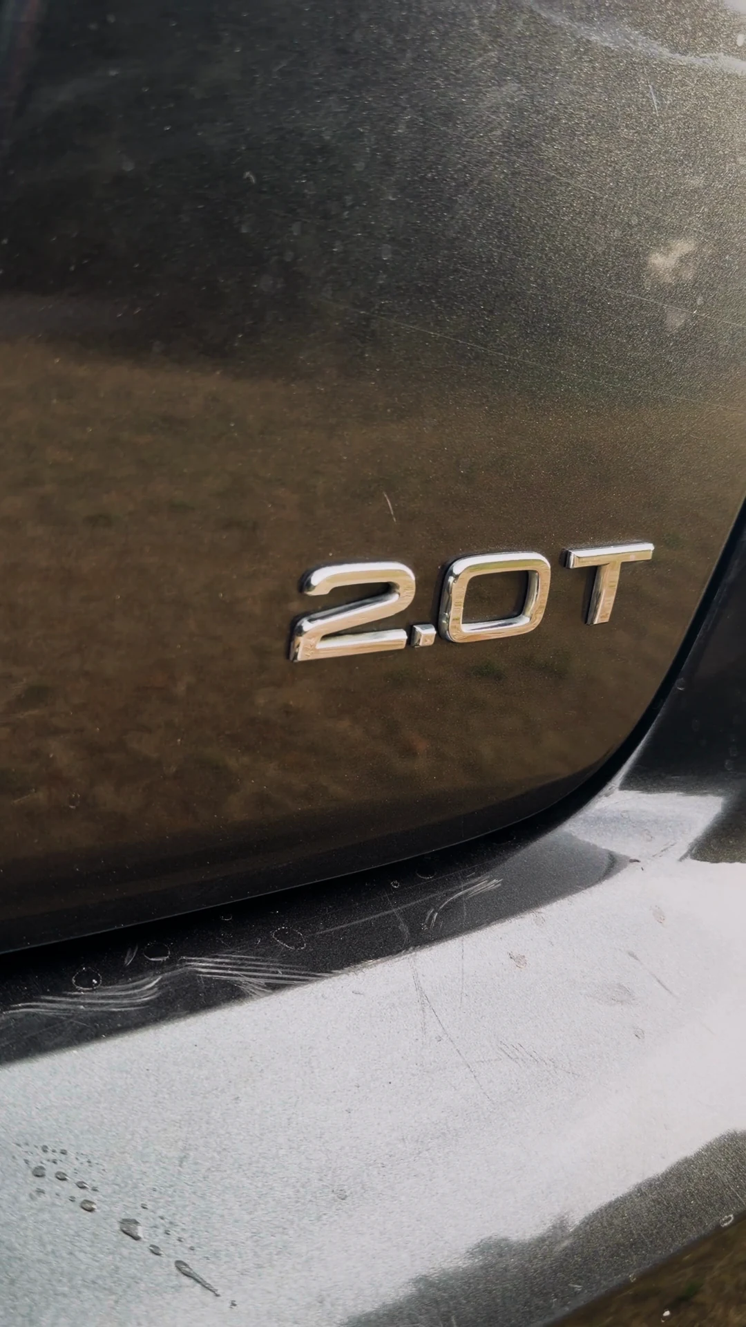 The Audi A3’s 2.0 T badge in sunlight